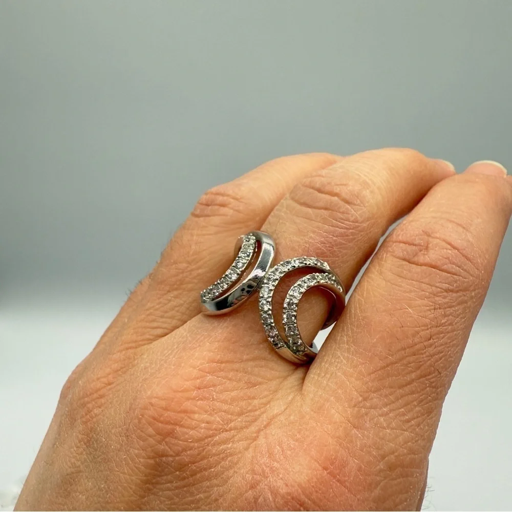Gorgeous 'Embrace' Infinity Style rIng with CZ studded band